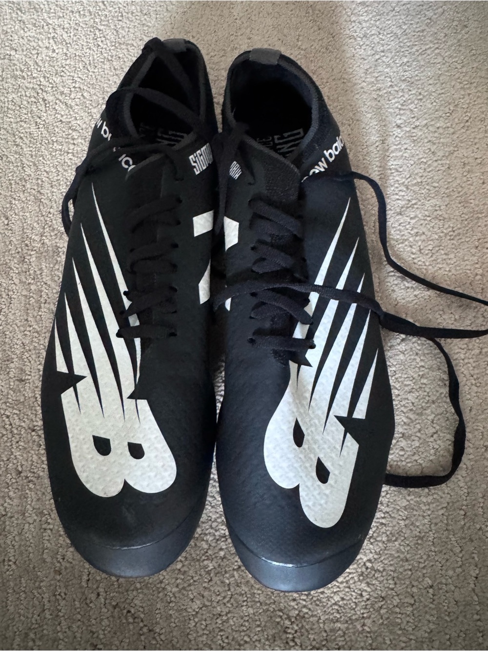 New Balance Black metal track cleats with White Logo 11sz